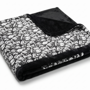 Scriblo Monster Mash coloring blanket on a white background